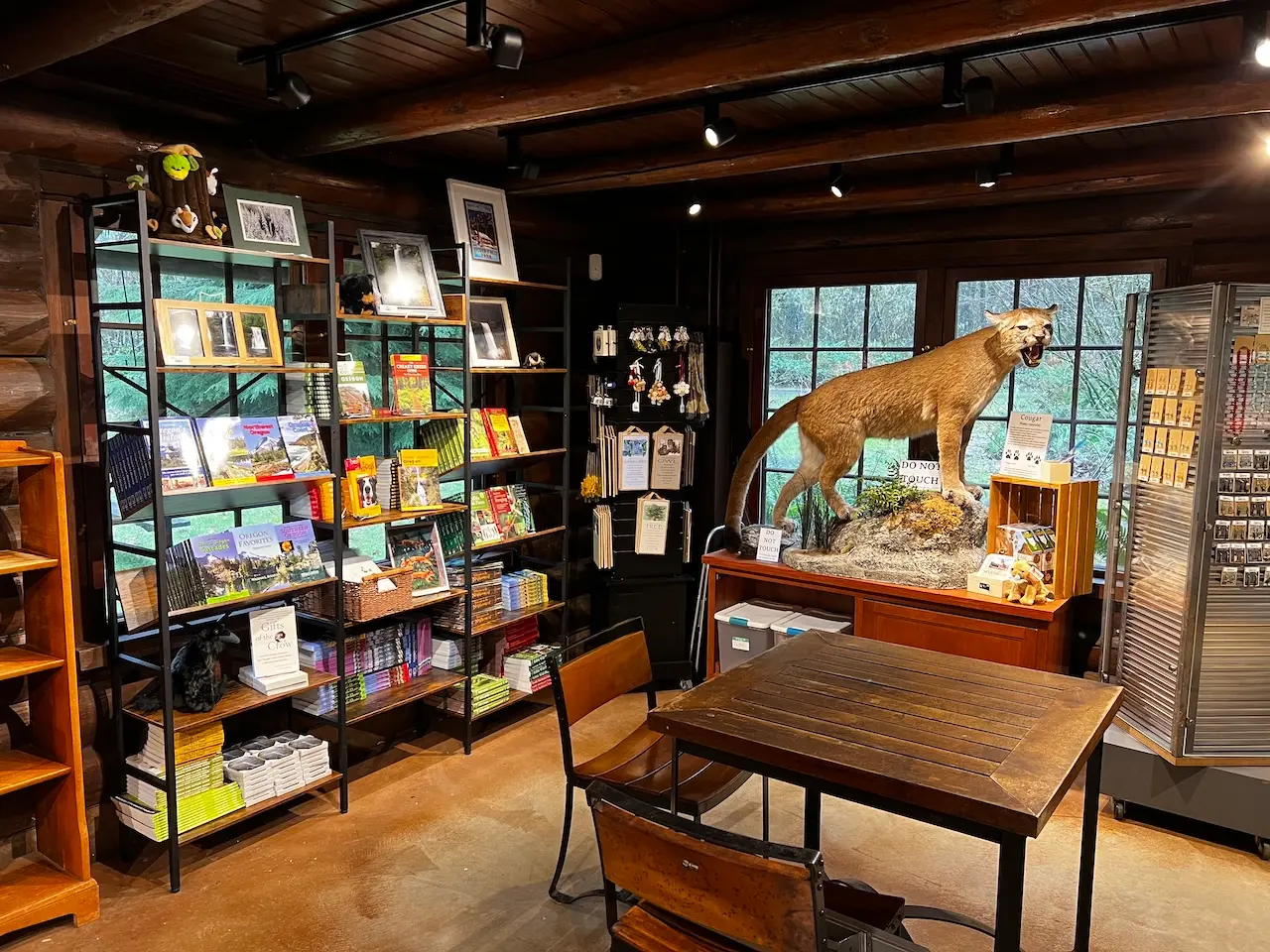 Camground Programs Rustic nature gift shop with wildlife display, regional travel books, and Pacific Northwest souvenirs
